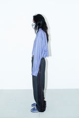 PIGMENT-DYED DISTRESSED TRACK TROUSERS