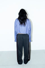 PIGMENT-DYED DISTRESSED TRACK TROUSERS