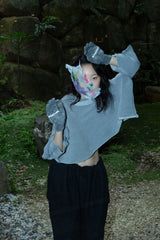 SEAMLESS DEFORMED DOLMAN SLEEVE/RIB