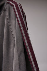 PIGMENT-DYED DISTRESSED TRACK JACKET