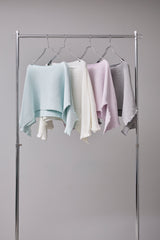 SEAMLESS DEFORMED DOLMAN SLEEVE/RIB