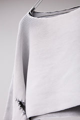 SEAMLESS DEFORMED DOLMAN SLEEVE/RIB