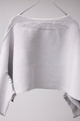 SEAMLESS DEFORMED DOLMAN SLEEVE/RIB