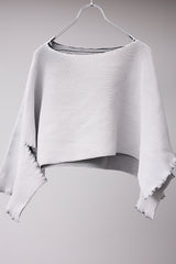 SEAMLESS DEFORMED DOLMAN SLEEVE/RIB