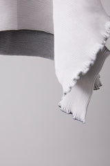 SEAMLESS DEFORMED DOLMAN SLEEVE/RIB