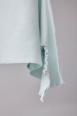 SEAMLESS DEFORMED DOLMAN SLEEVE/RIB