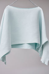 SEAMLESS DEFORMED DOLMAN SLEEVE/RIB