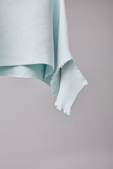 SEAMLESS DEFORMED DOLMAN SLEEVE/RIB