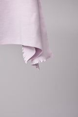 SEAMLESS DEFORMED DOLMAN SLEEVE/RIB