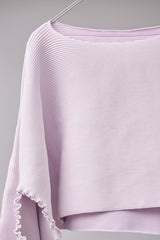 SEAMLESS DEFORMED DOLMAN SLEEVE/RIB