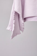 SEAMLESS DEFORMED DOLMAN SLEEVE/RIB