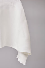 SEAMLESS DEFORMED DOLMAN SLEEVE/RIB