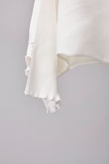 SEAMLESS DEFORMED DOLMAN SLEEVE/RIB