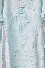 SEAMLESS DEFORMED THIN KNIT/COMPLEX