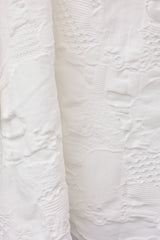 SEAMLESS DEFORMED DOLMAN SLEEVE/COMPLEX