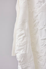 SEAMLESS DEFORMED DOLMAN SLEEVE/COMPLEX