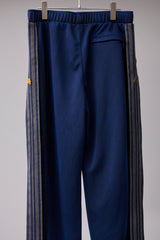 PIGMENT-DYED DISTRESSED TRACK TROUSERS