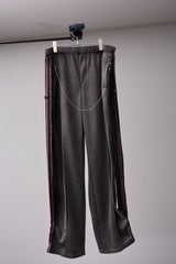 PIGMENT-DYED DISTRESSED TRACK TROUSERS