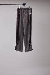 PIGMENT-DYED DISTRESSED TRACK TROUSERS