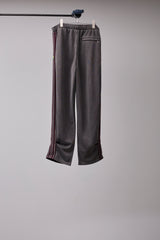 PIGMENT-DYED DISTRESSED TRACK TROUSERS