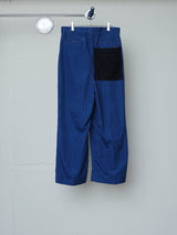 COATED INDIGO TAILORED PANTS