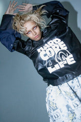 CHINORESLEEVELEATHERT