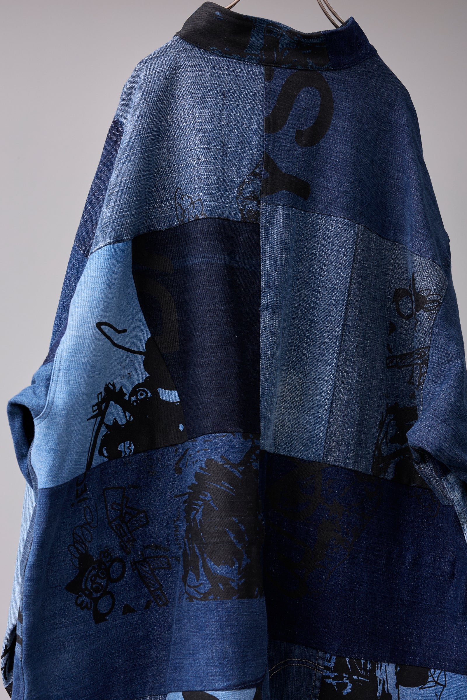PATCHWORK MIL COAT MADE FROM RECONSTRUCTED VINTAGE DENIM 
