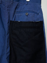 COATED INDIGO TAILORED PANTS