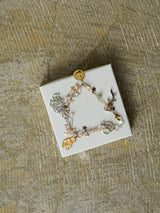 WORLD HAPPINESS CHARM BRACELET