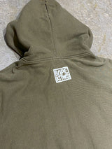 A BATHING APE (BAPE) × KAWS / “CHUM" NOSE ART GRAPHIC FULL-ZIP HOODIE (OLIVE DRAB)