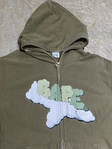 A BATHING APE (BAPE) × KAWS / “CHUM" NOSE ART GRAPHIC FULL-ZIP HOODIE (OLIVE DRAB)