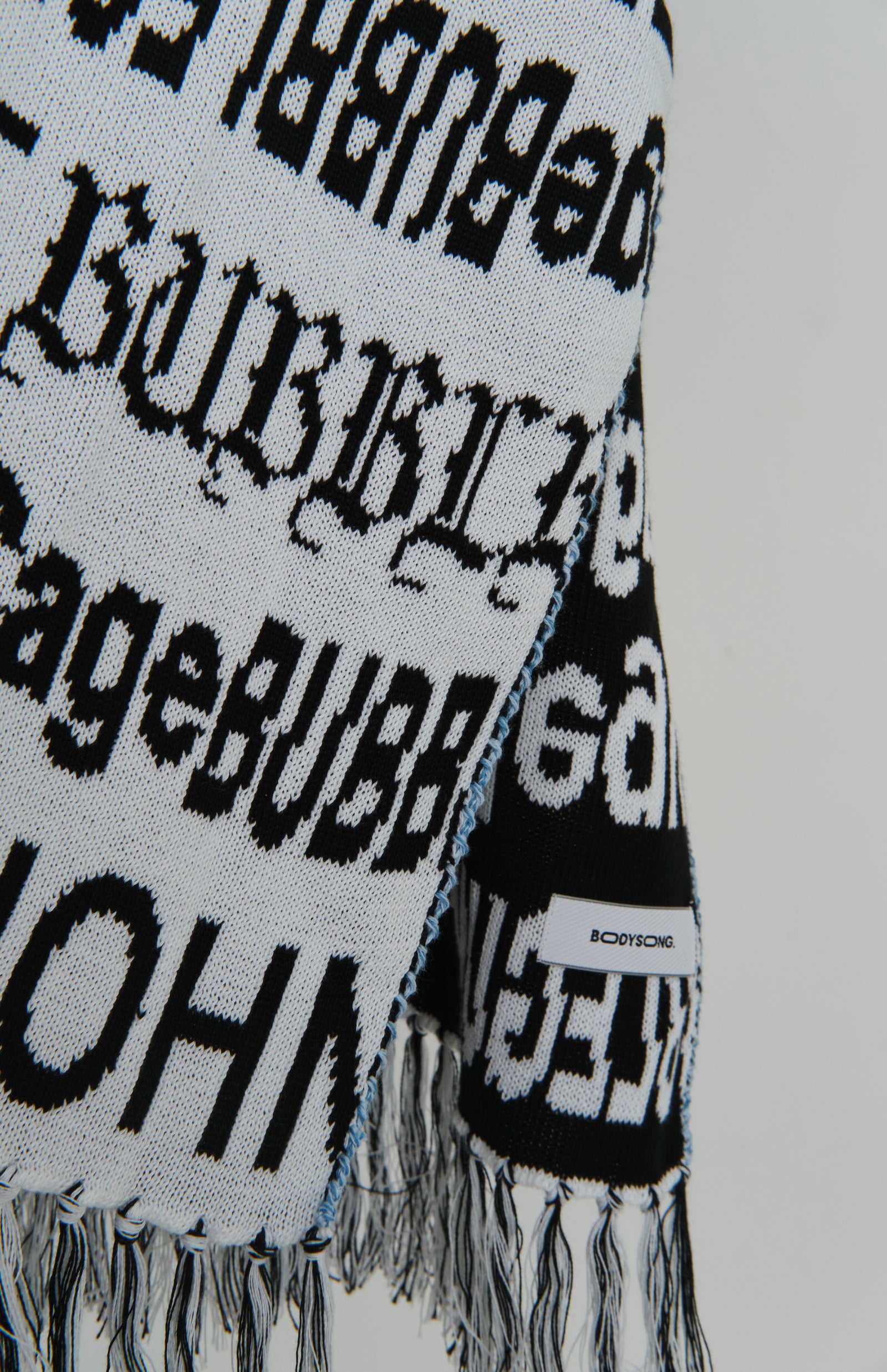 HIPPIEREVERSIBLEPONCHO BLACKMIX – BODYSONG. ONLINE STORE
